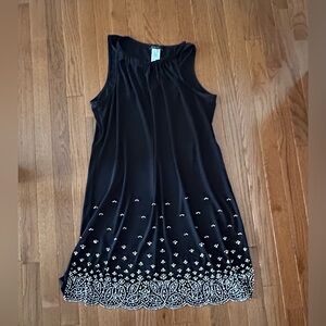 Chic Black Midi Dress with Silver Detailing and Elegance.